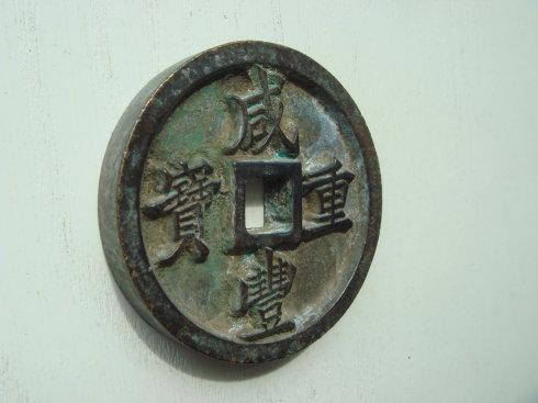 ����ͼ�ϵ���ö�����ر�������һö ��ĸ