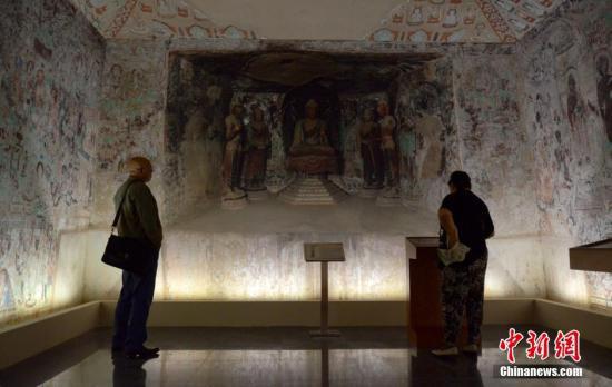 ����ͼ��2014��8��28�գ��ɶػ��о�Ժ�ٰ�ġ����ֶػ�չ����������Ļ�������緢 ��־�� ��